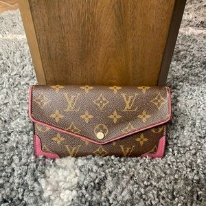 Louis Vuitton Sarah wallet, monogram and fuchsia